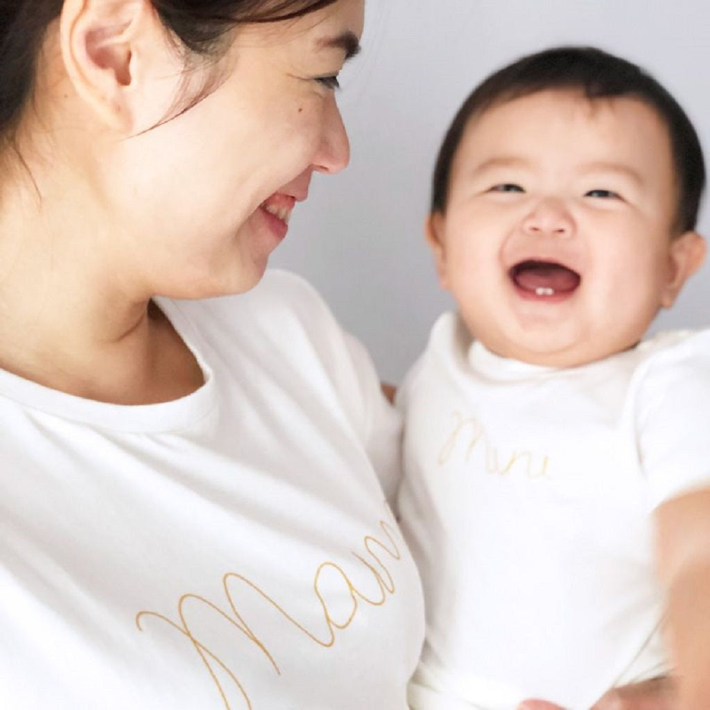 Le Petit Society Mini Short Sleeves Romper in White/Gold